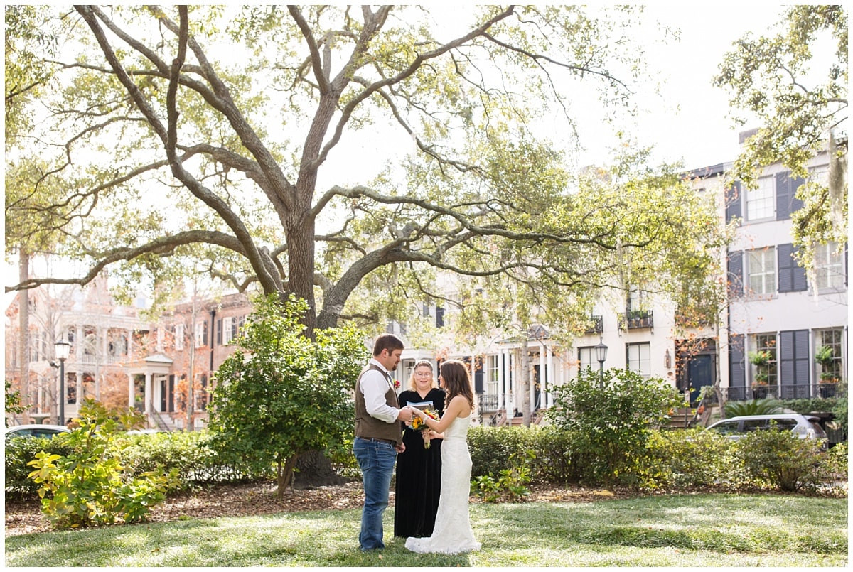 couple getting married under oak trees in savannah