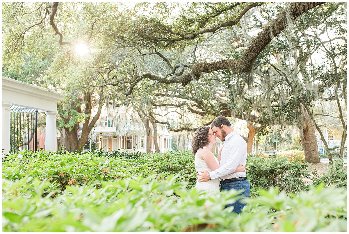 newly engaged couple in forsyth park in spring in savannah