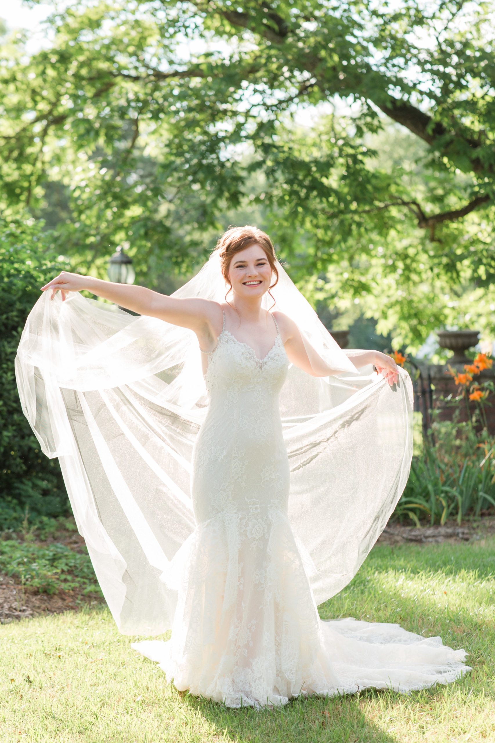 bride with sun shining through dress